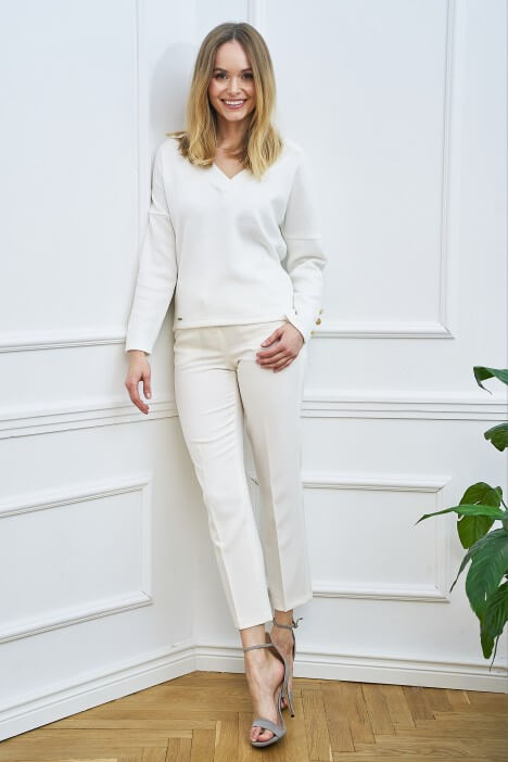 Białe ubrania – idealny wybór na lato